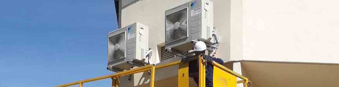 pose climatiseur daikin façade entreprise beziers